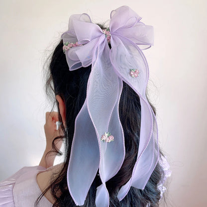 Pince à cheveux nœud papillon